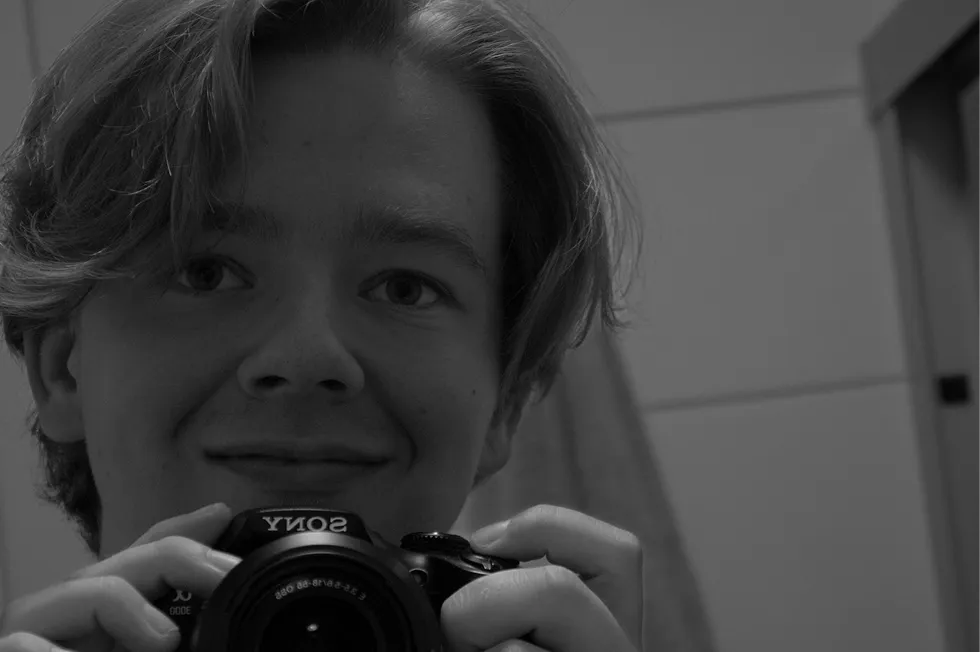 Selfie of me smiling with my camera